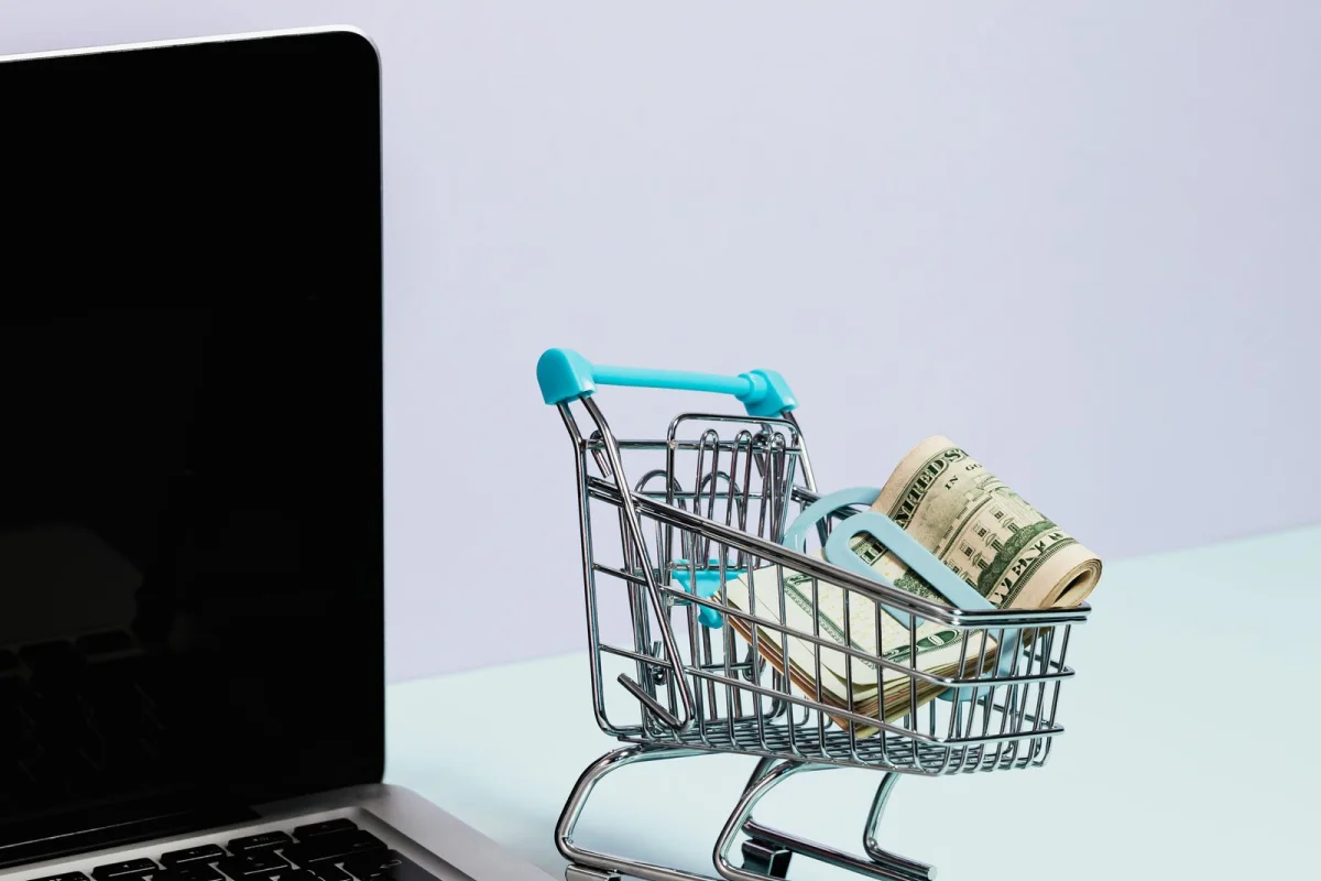 Customer making an online purchase with a credit card on a laptop