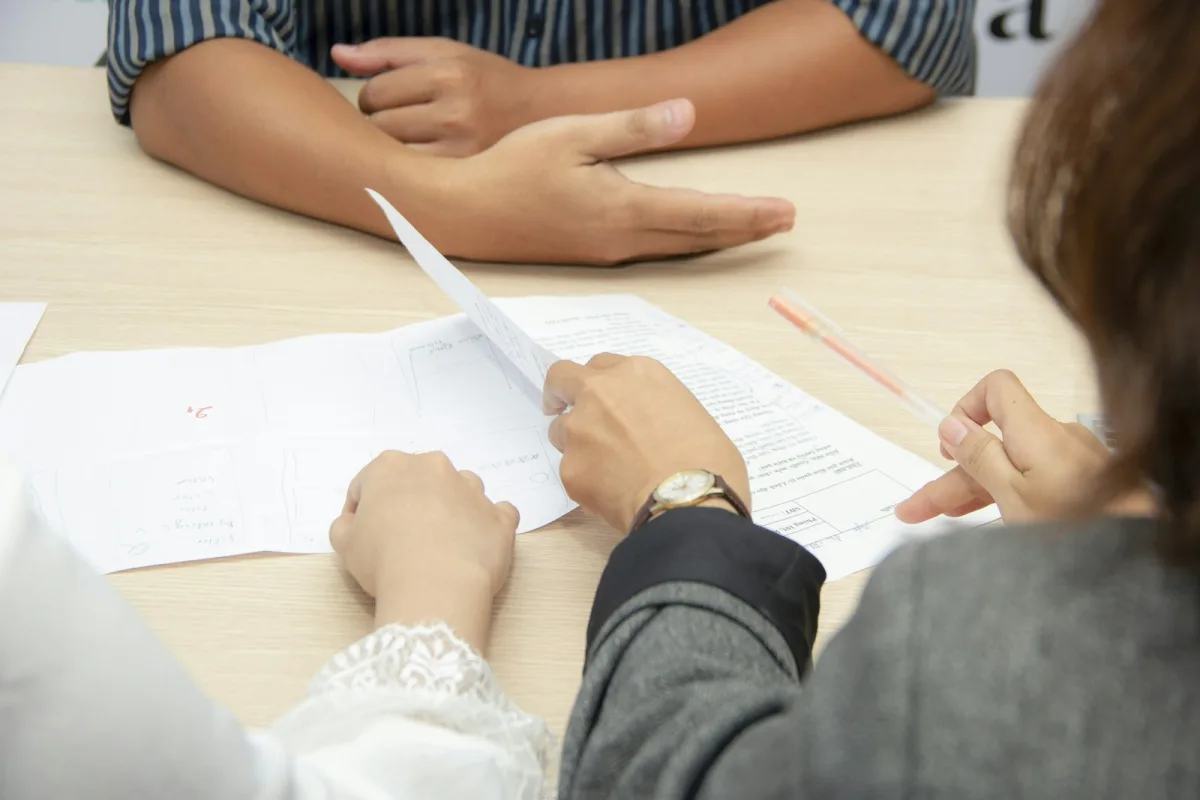 Recruiter reviewing a candidate resume during the screening process
