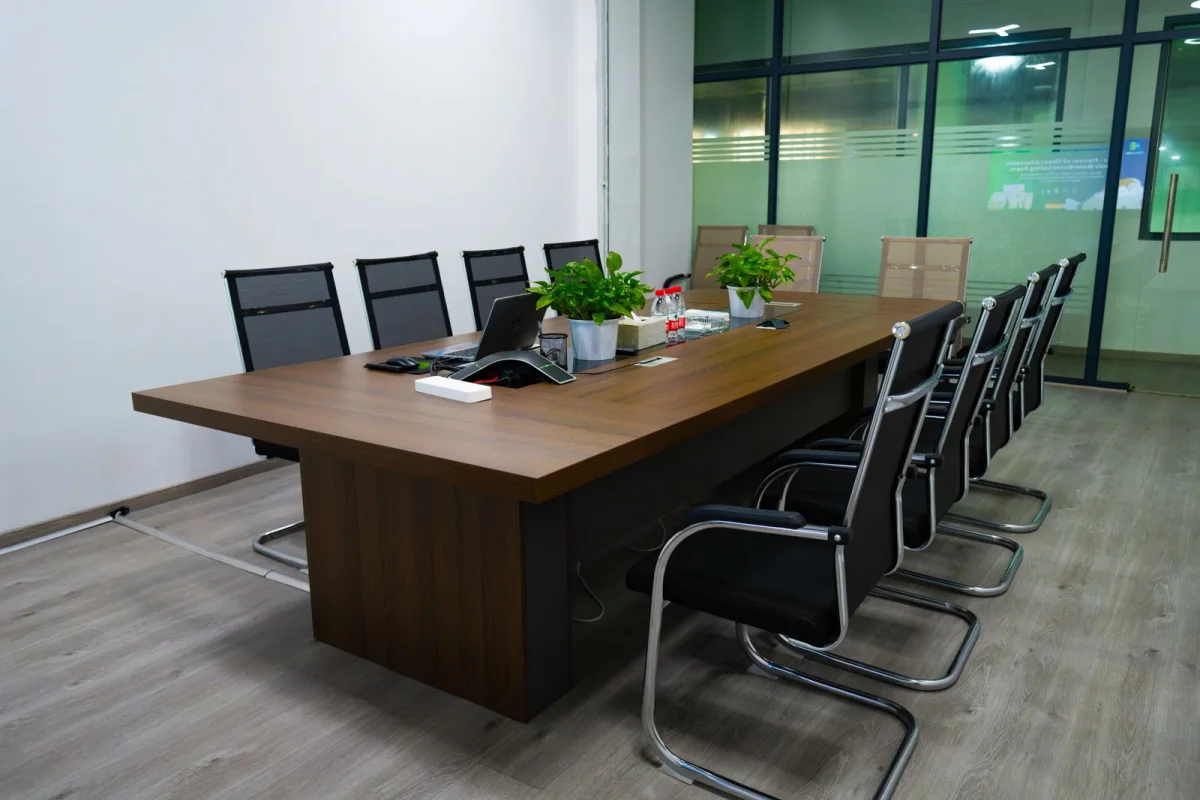 HR professionals collaborating and celebrating a successful hire in a modern office
